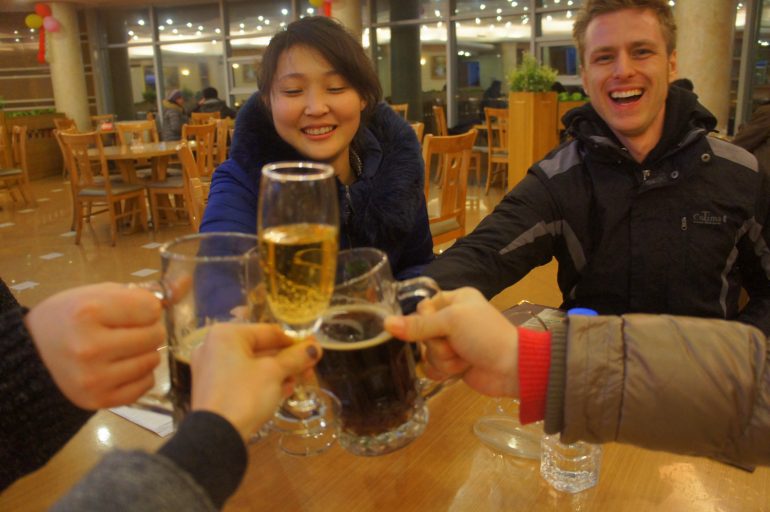 Enjoying local beer in North Korea